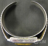 M2007.087.038d.jpg; M2007/087:038; wrist watch with handmade, engraved metal band; watches